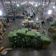 Employees sort through packages at a shipping hub in Wuhan, Hubei province the day after Singles Day.